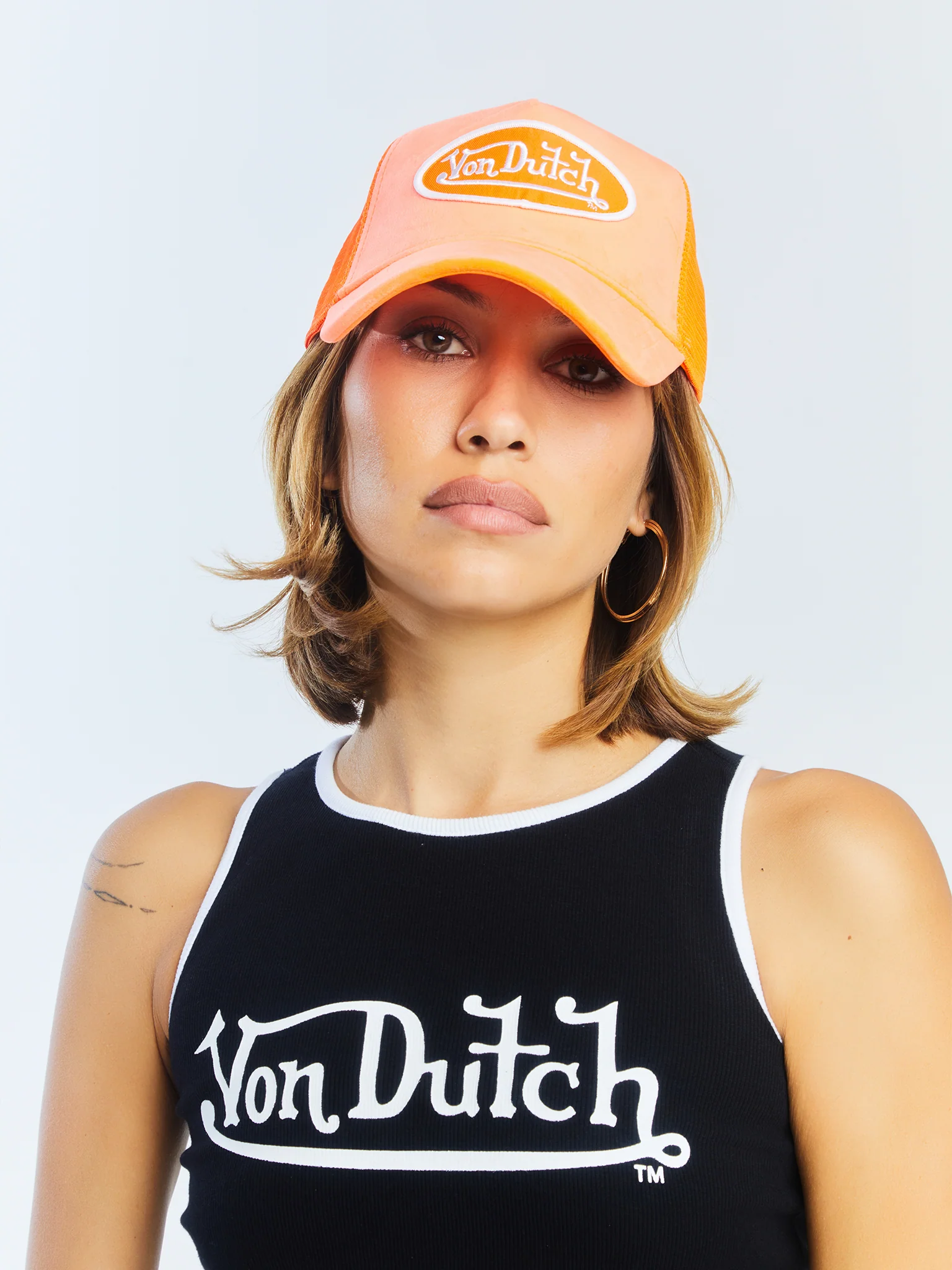 83-neon-orange-velvet-trucker-hat-6.webp Neon Orange Velvet Trucker Hat