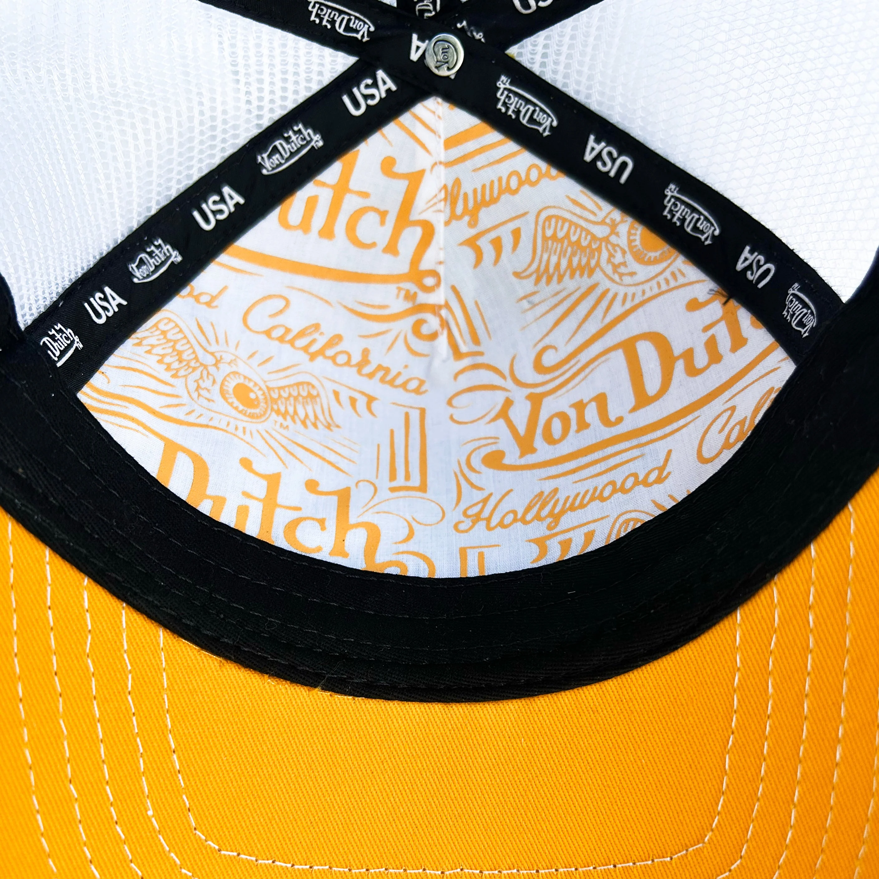 956-infinite-gold-trucker-hat-6.webp Infinite Gold Trucker Hat